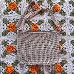 The Sak beige crocheted purse with shoulder strap